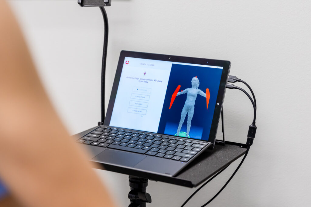 a view of the Styky 3D bodyscan screen show a 3D impression of a patient's body. This system gives us quantifiable, measurable data about a patient's progress, including reducing inflammation and lymphedema with lymphatic drainage massage in Kalamazoo County. 